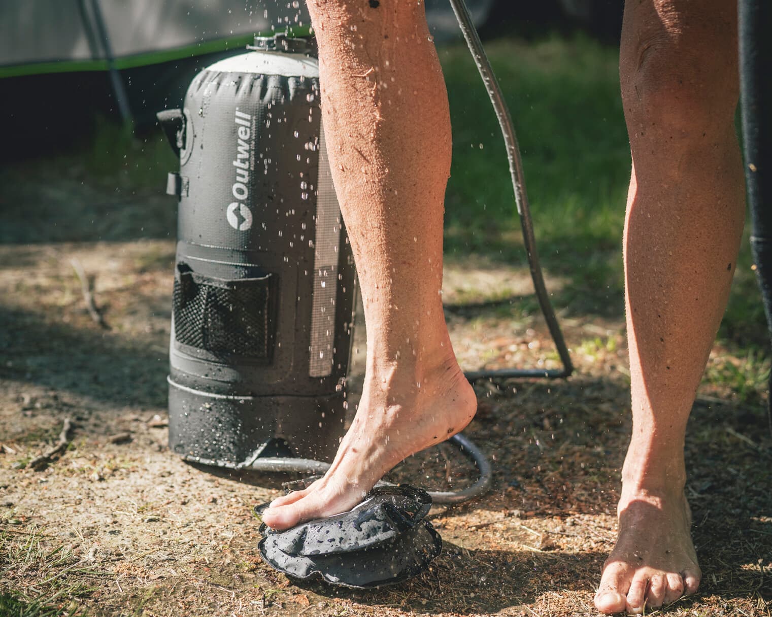 Outwell Seabreeze Pressure Shower in use with pressure pump