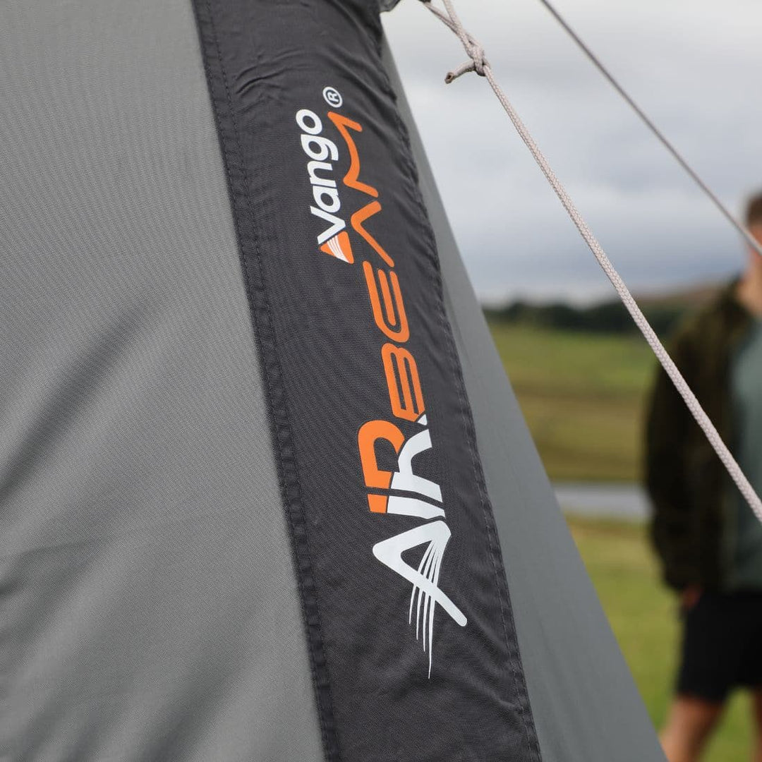Close-up of Vango AirBeam technology logo on the side of an awning, showcasing durable inflatable beam construction.