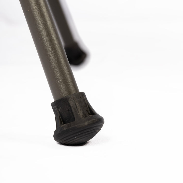 Close-up of the chair’s rubber foot for stability on uneven terrain, part of the durable design of this foldable outdoor chair.