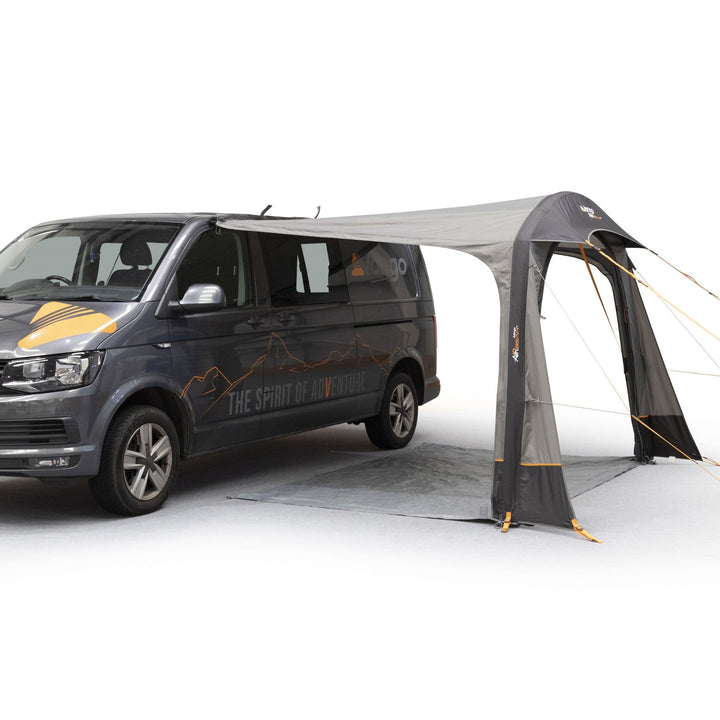 Side view of the Vango Sunlight Air canopy with its open canopy extension providing shaded outdoor space for campervan users.