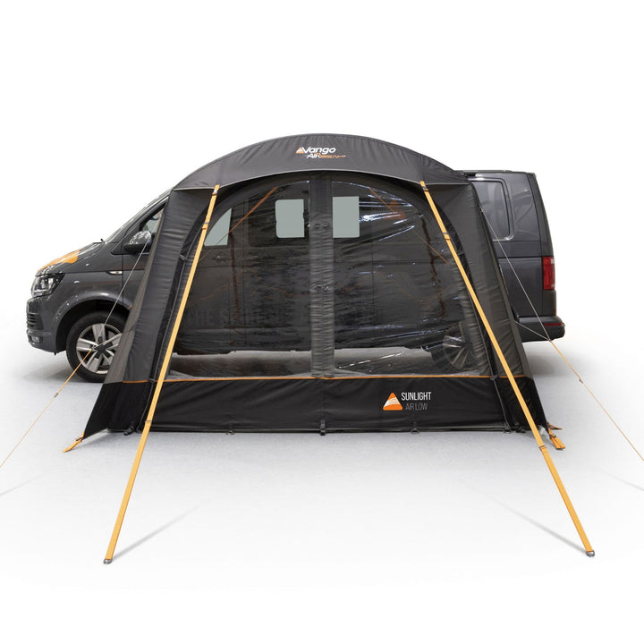 Front view of the Vango Sunlight Air canopy with its door closed and windows open to allow maximum light into the sun canopy.