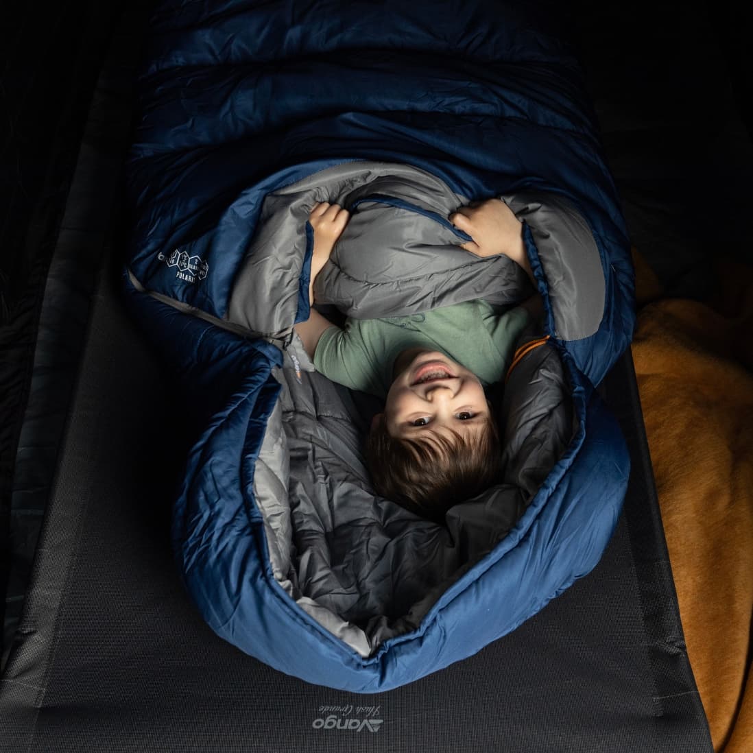 Inside the darkened midnight bedrooms of the vango Tacoma Air 800xl.