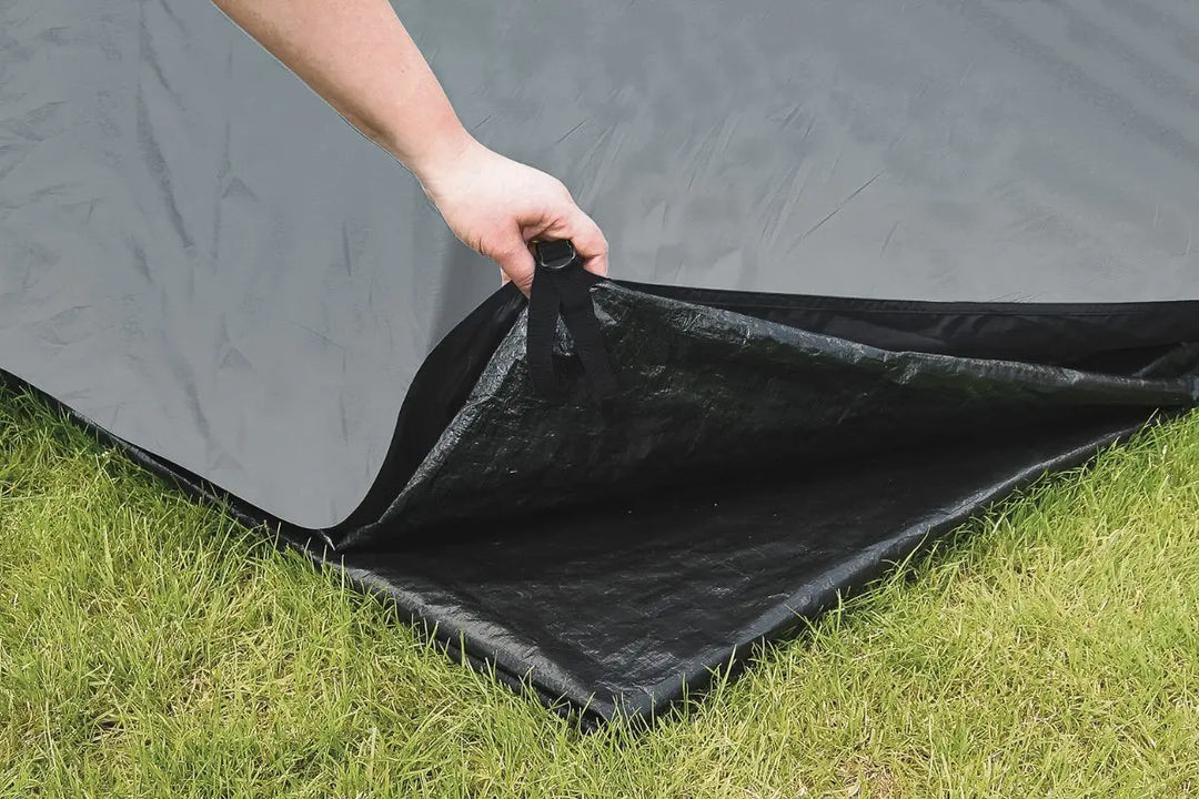 Close-up of a durable green footprint groundsheet designed for camping tents and awnings, offering added protection and insulation against damp ground.