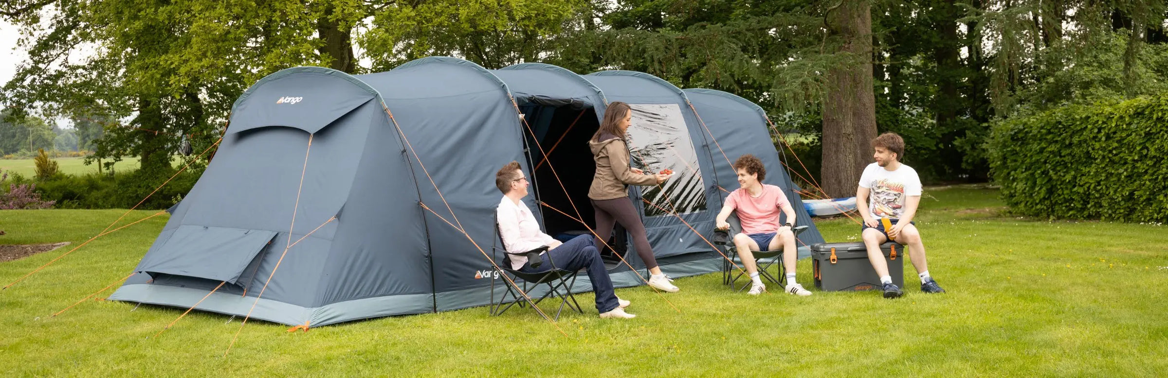 Extra-large 8 man tent pitched in a campsite, offering ample space for group camping trips.