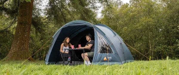 Vango poled tent pitched on a campsite in the UK.