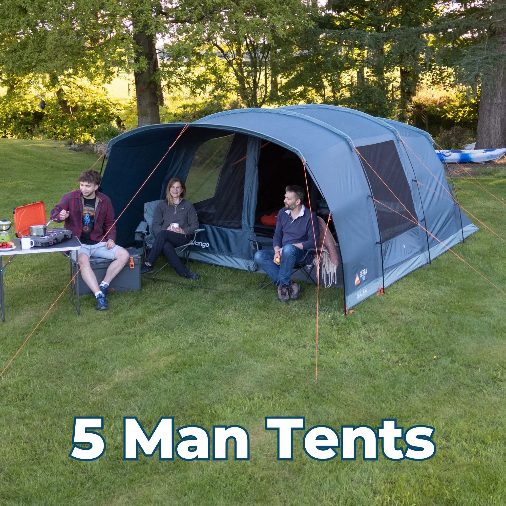 5 Man Tents – Vango poled tent with campers enjoying a meal and conversation outdoors.