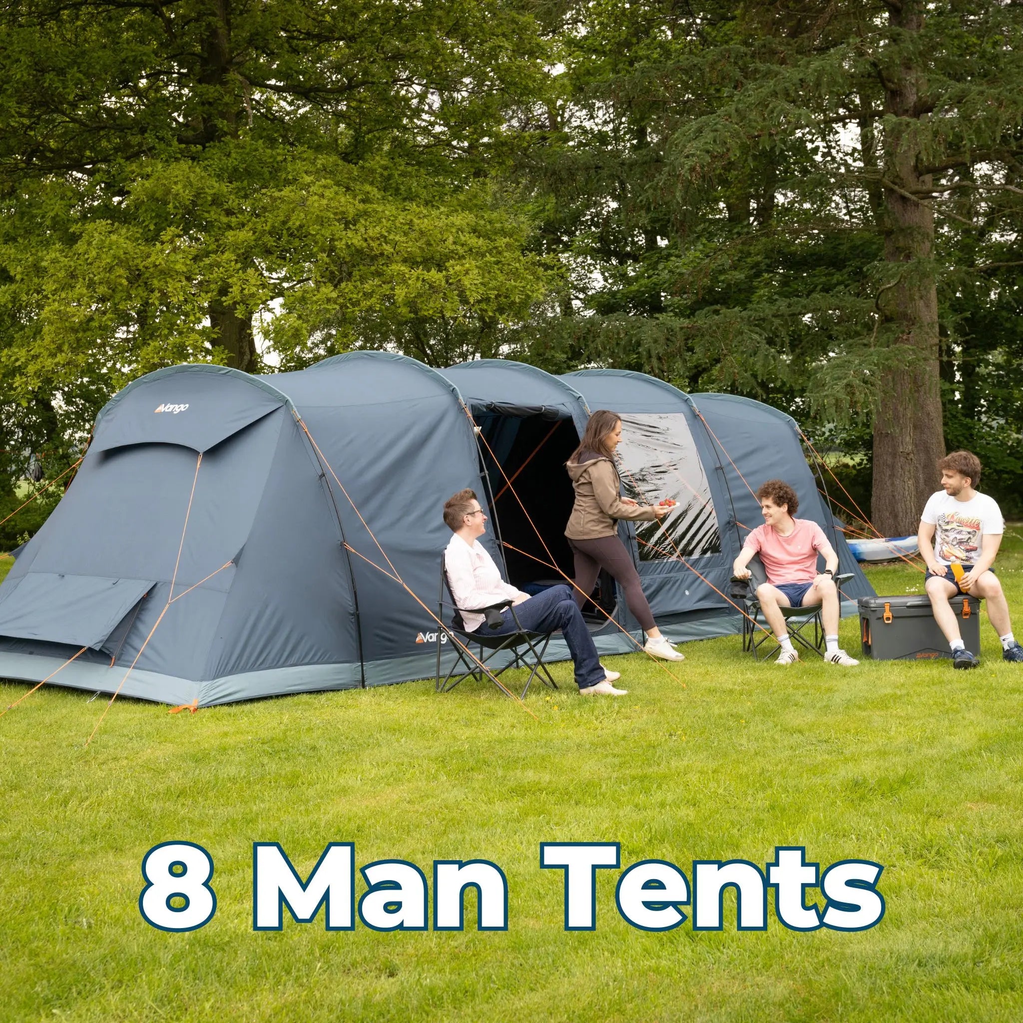 8 Man Tents – Large Vango Tacoma 800xl tent set up on a grassy field, with a group relaxing outside.