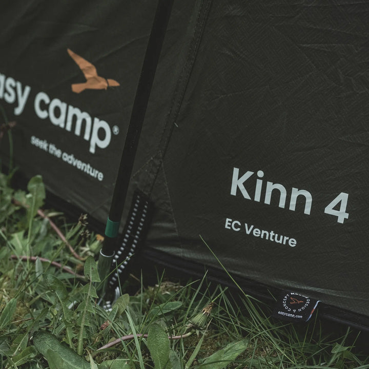 Black Easy Camp Kinn 4 EC Venture tent with branding on grass