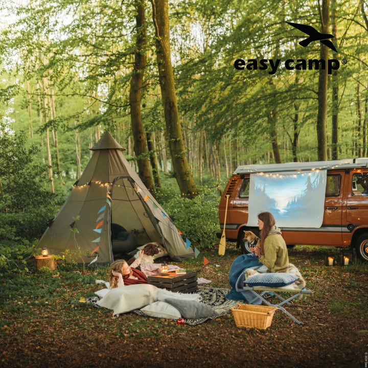 Easy Camp Moonlight Tipi Glamping Tent next to Campervan