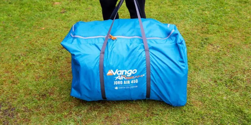 Blue Vango AirBeam tent bag on grass.