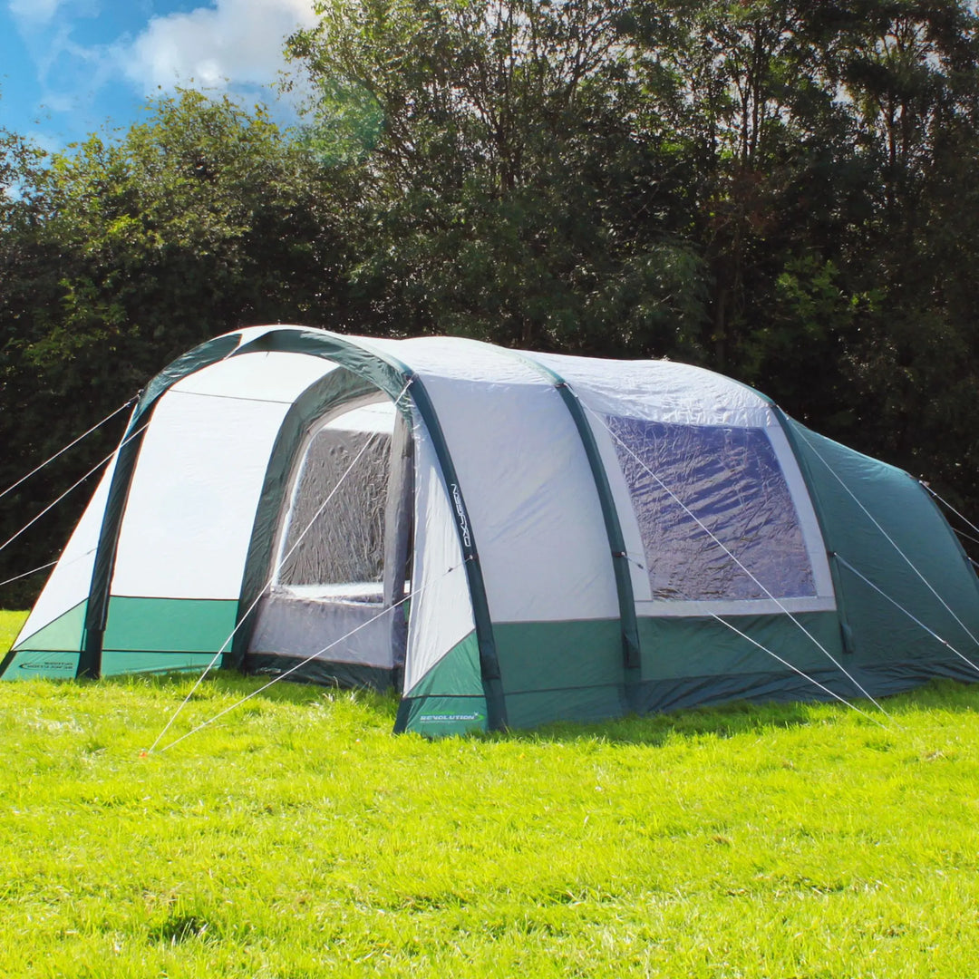 Front view of the Outdoor Revolution Atom 500 Air Tent showing large clear windows and open front porch.