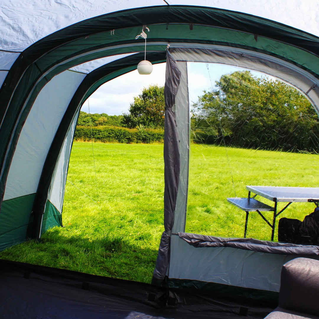 Open doorway view of the tent’s interior, showing the spacious living area and natural light.