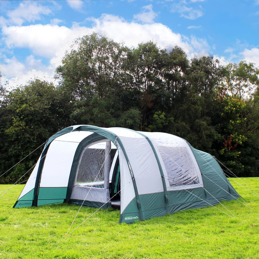 Outdoor Revolution Atom 500 Air Tent pitched on grass with guy ropes secured.