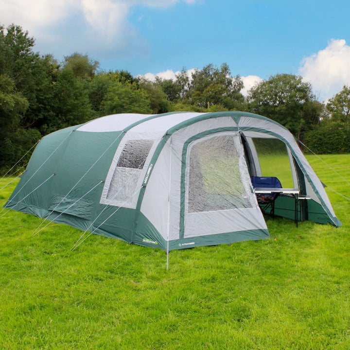 Outdoor Revolution Atom 600 Air Tent with a partially opened front door, showing the interior.