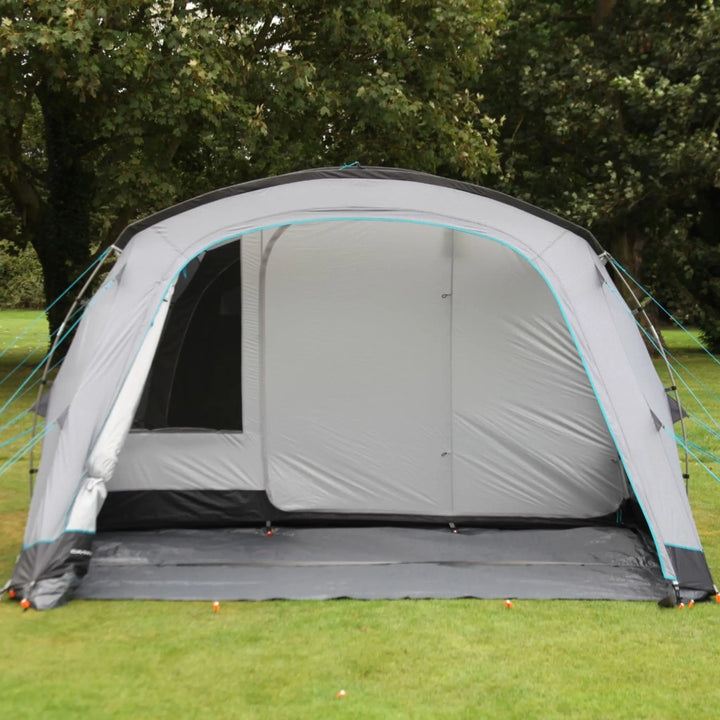 Interior view of the Outdoor Revolution Camp Star 500XL DT with the entrance door open, showing the secondary door for separate living areas.