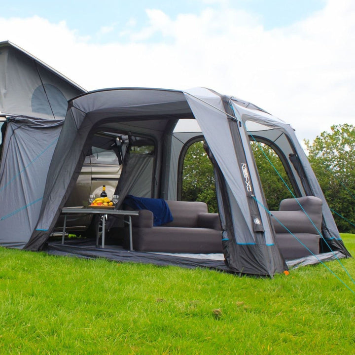 The front of the Outdoor Revolution Cayman Air Low Awning displays its wide entrance and functional design, ideal for campervan users seeking a reliable inflatable drive-away awning.