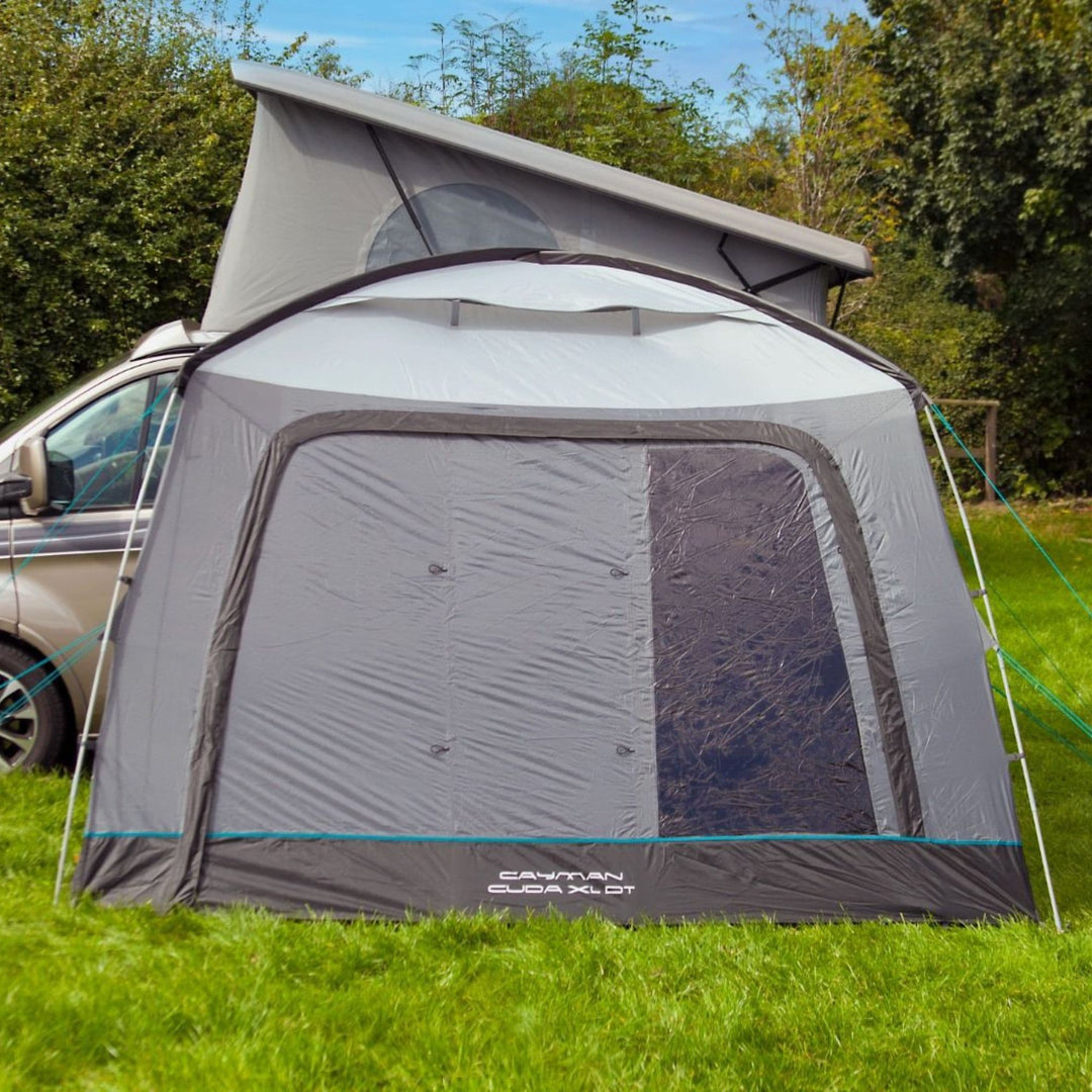 Front view of the Outdoor Revolution Cayman Cuda XL F/G Awning, emphasizing the waterproof fibreglass drive away awning design with its large door panels.