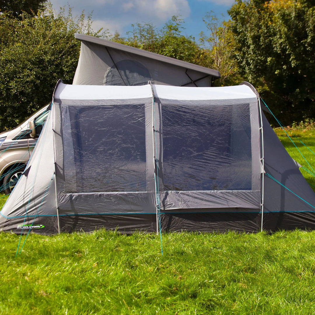 Side view of the Outdoor Revolution Cayman T3 DT Low Poled Awning, illustrating its high-quality fabric and easy-access front door design. Perfect for campervans, this drive-away awning provides ample space for camping.