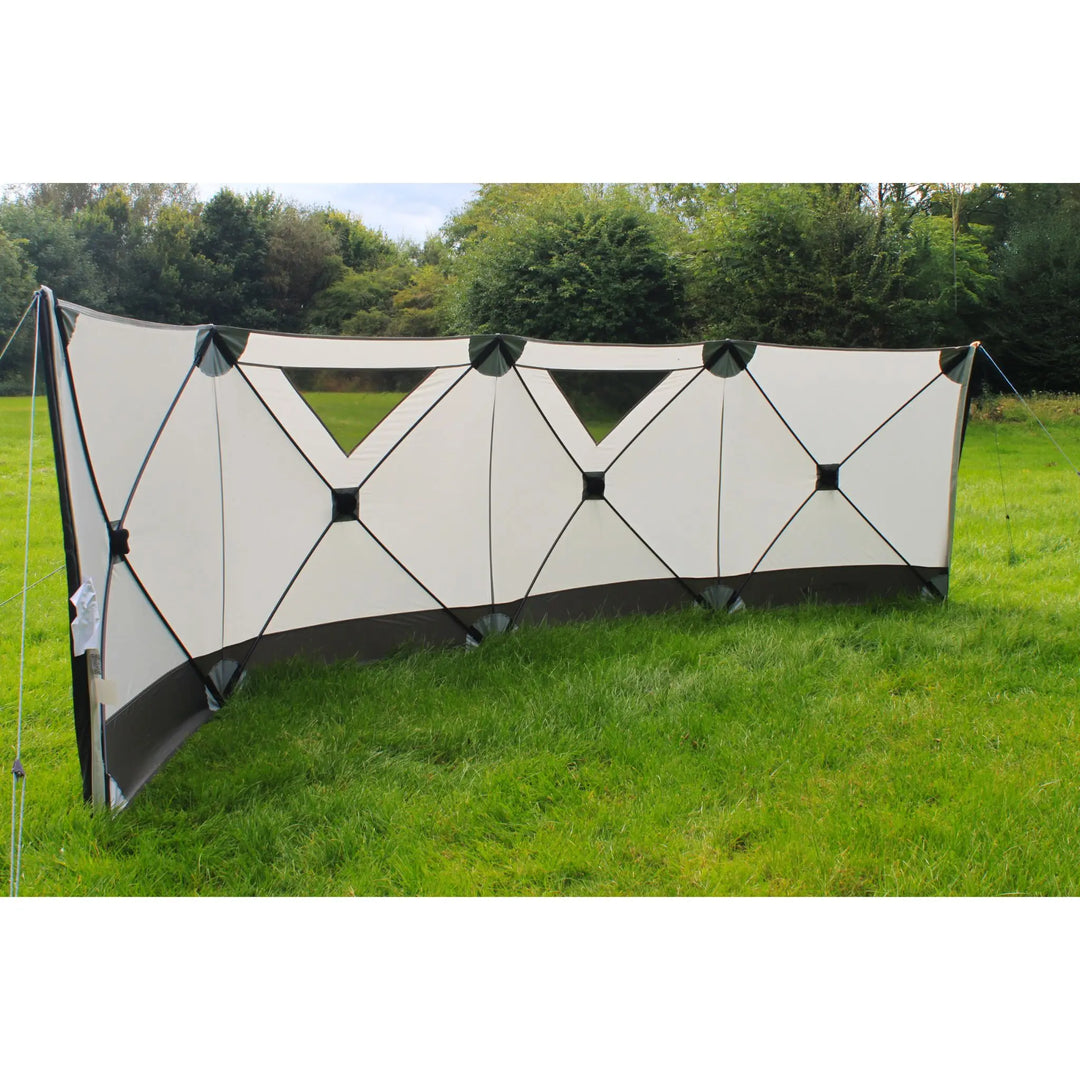 Outdoor Revolution Pronto 4 Windbreak showing its durable material and fibreglass support structure, designed for weather protection during outdoor activities.