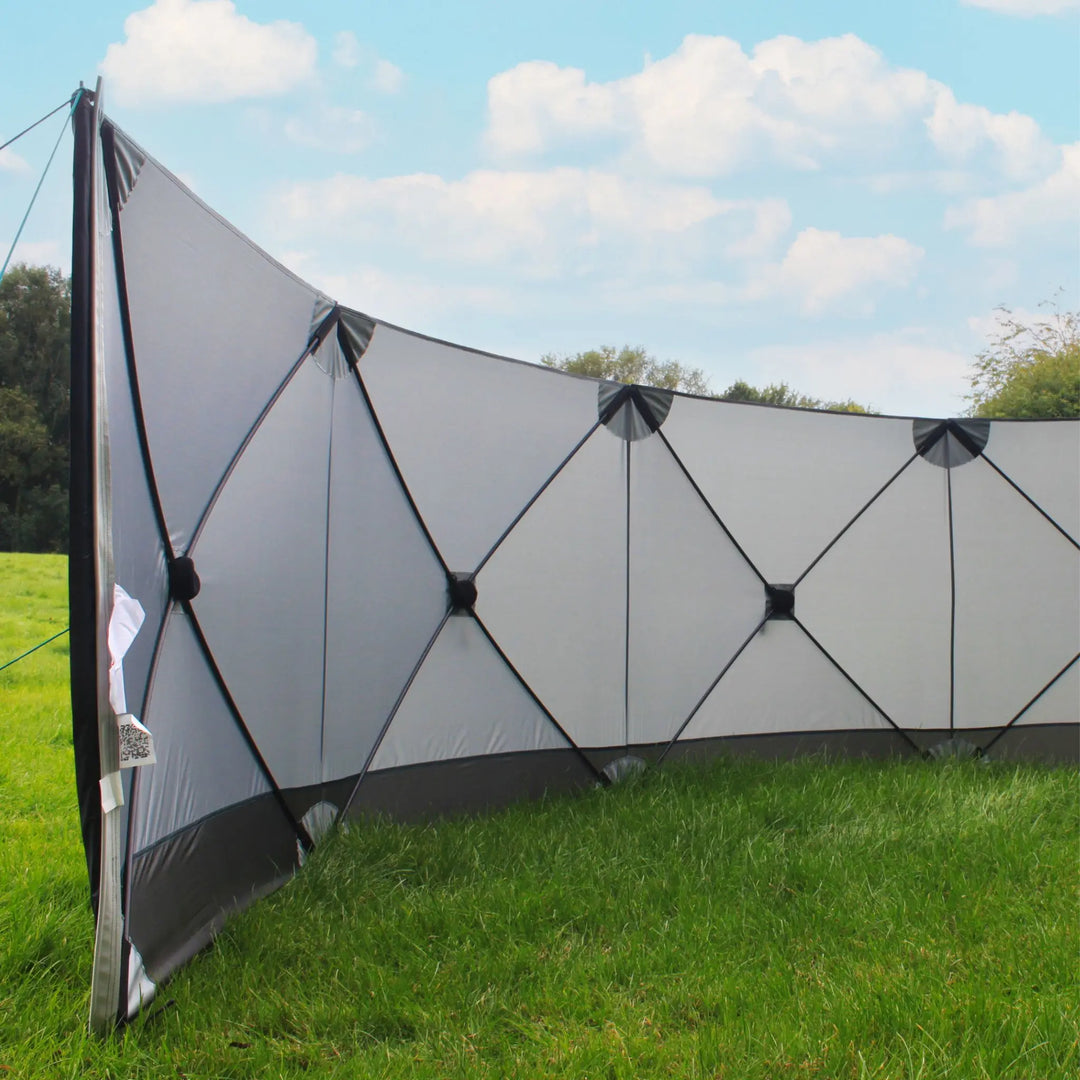 Side view of the Outdoor Revolution Pronto Compact 4 windbreak showing structural fibreglass support.