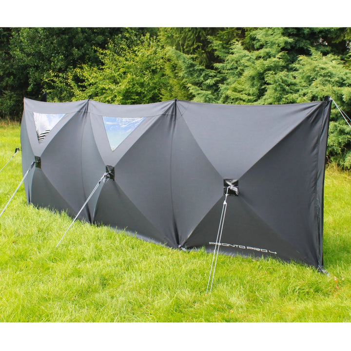 Side view of the Outdoor Revolution Pronto Pro 4 Windbreak showing its sturdy construction and clear window panels.