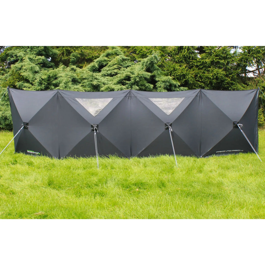 Front view of the Outdoor Revolution Pronto Pro 4 Windbreak fully set up, providing privacy and wind protection outdoors.