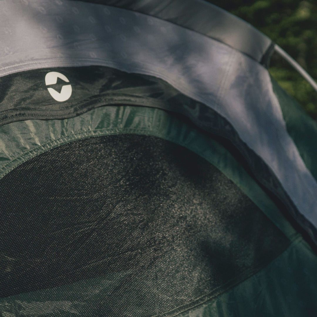 Close-up of a Outwell Earth 3 Plus Tent front door with a an Outwell logo