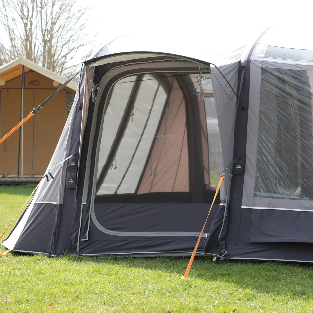 Entrance of the Vango AirBeam Anantara IV Air 650XL premium tent, featuring a mesh side door and panoramic windows for ventilation and light.