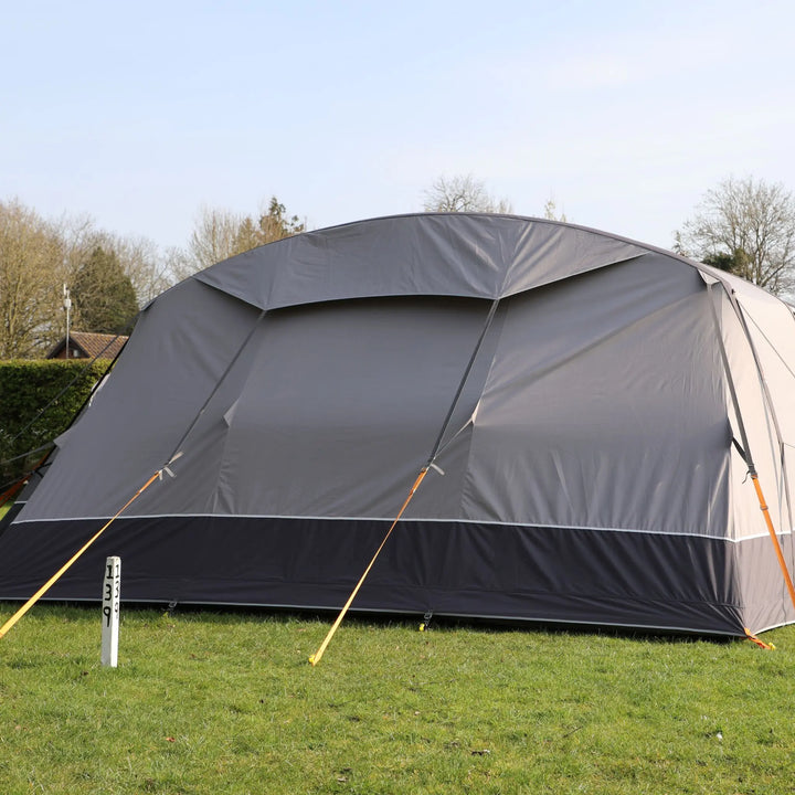 Rear view of the Vango AirBeam Anantara IV Air 650XL tent, showcasing its ventilation system and sturdy guy ropes.