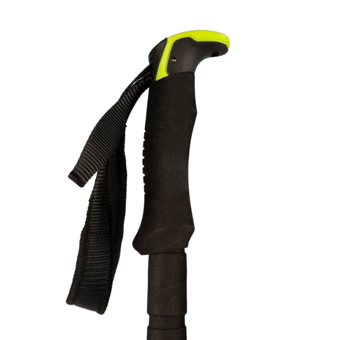 Detailed shot of the hand gripping the handle of the Vango Annapurna Walking Pole with a supportive strap.