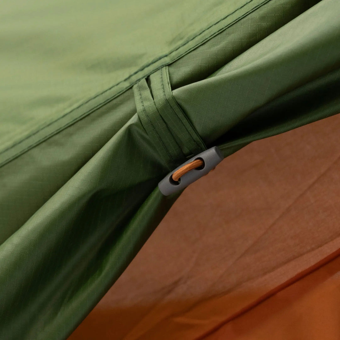 Close-up of the Vango Apex Compact 200 Tent's outer canvas, demonstrating weather resistance and lightweight material suitable for trekking and backpacking.