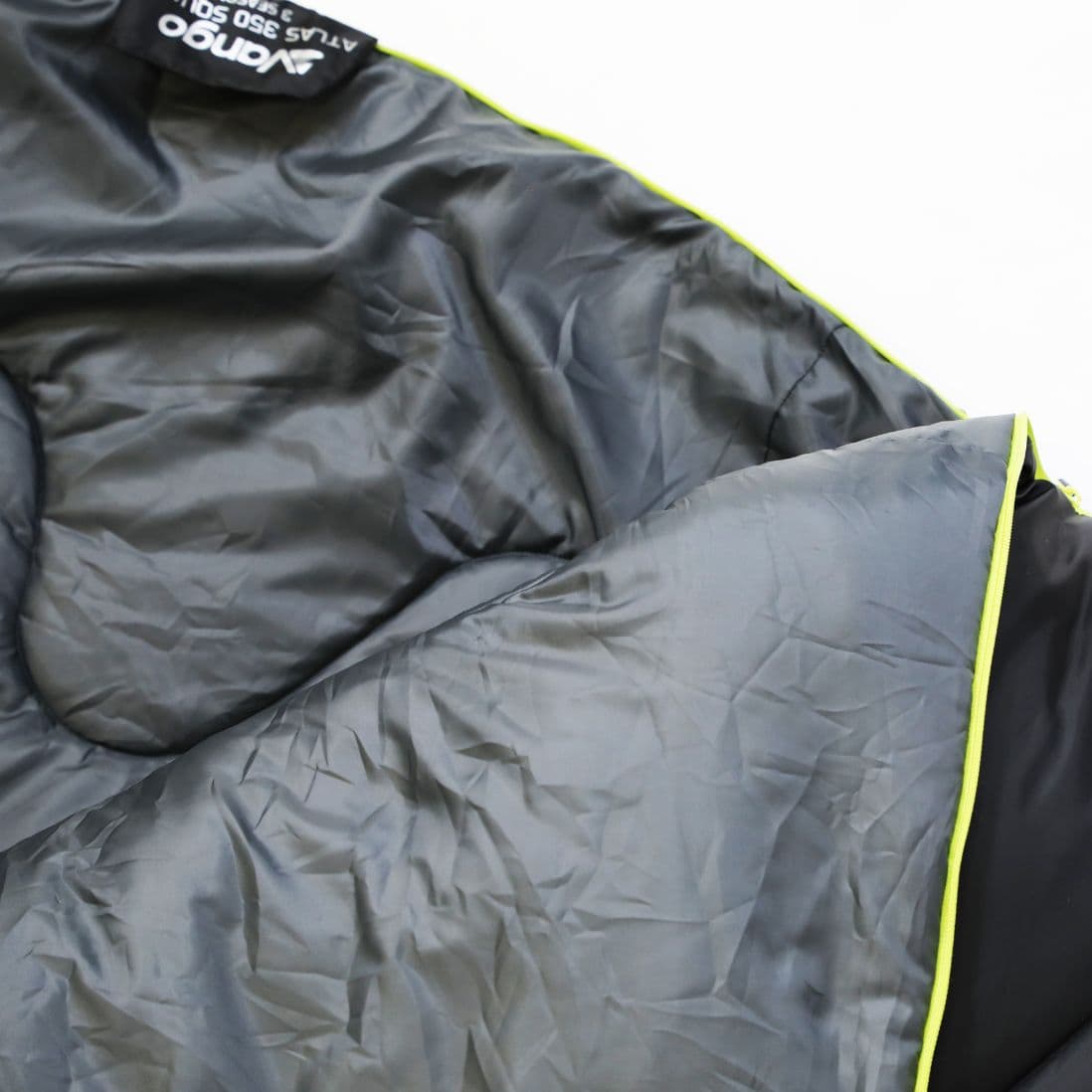 Interior view of the Vango Atlas 350 Quad large sleeping bag showing the soft Polair lining and S-stitched insulation lock for even heat distribution.