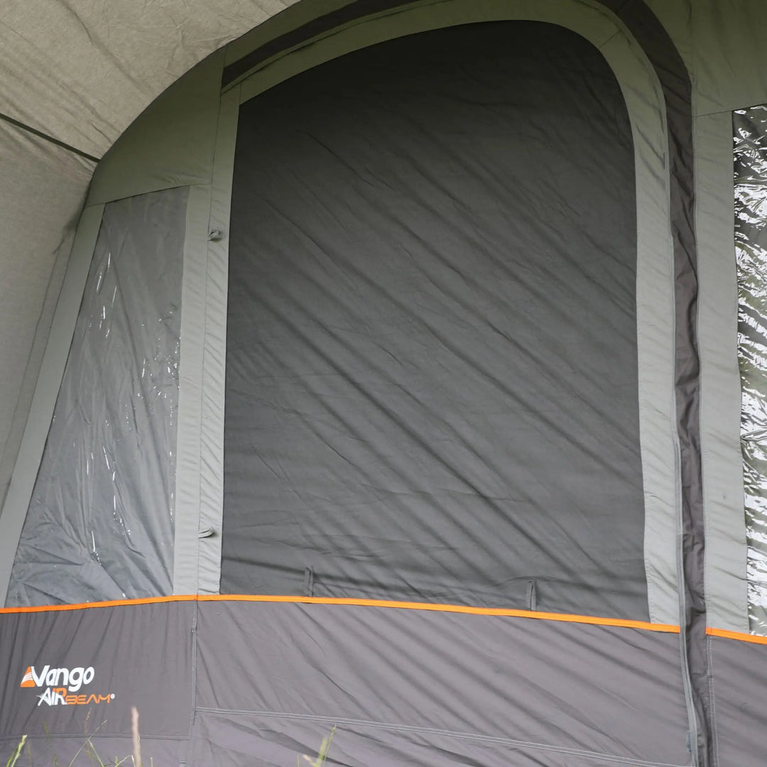 Close-up view of the Vango Cove III Air Low awning’s front door showing durable fabric and window feature.