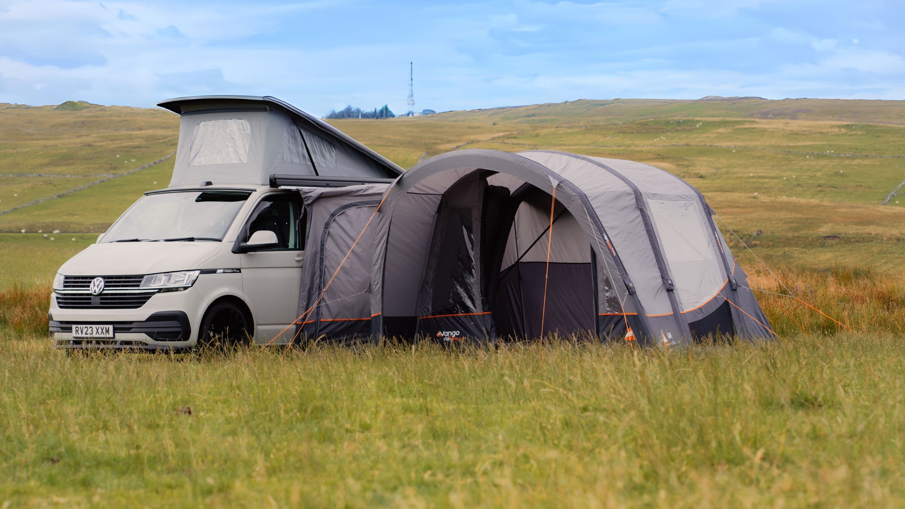 Vango Cove III Air Low Drive Away Awning attached to VW Campervan