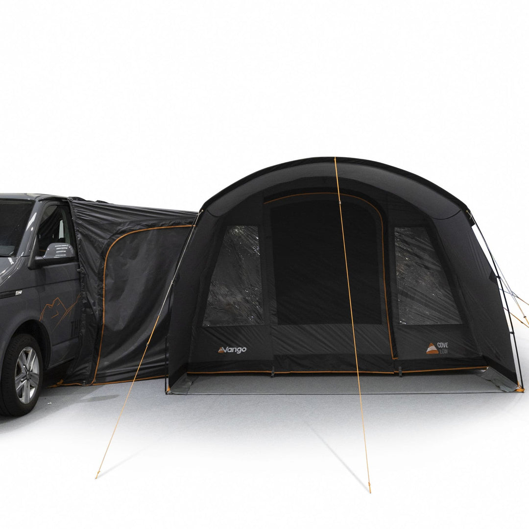 Vango Cove III Low drive away awning set up next to a campervan, ideal for outdoor adventures and VW camper trips.