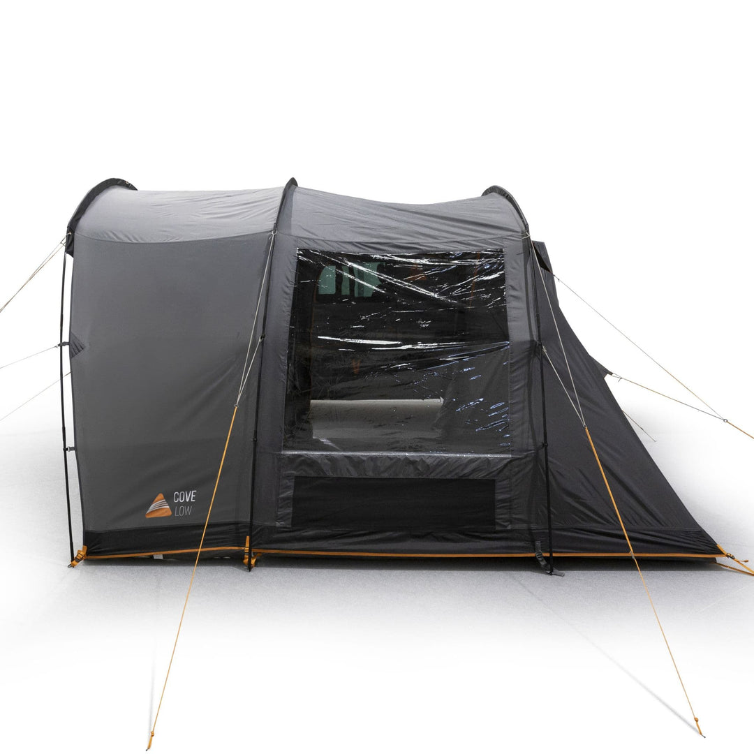 Side view of the Vango Cove III Low drive away awning connected to a campervan, highlighting its large windows and durable structure.