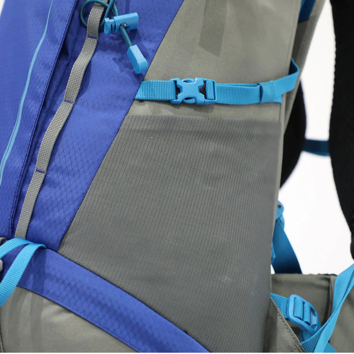 Detailed close-up of the side pocket on the Vango Denali Pro 60:70, ideal for holding water bottles during hiking.