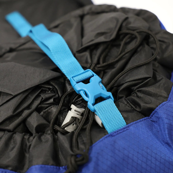 Close-up of the Vango Denali Pro 60:70S rucksack compression strap with drawstring closure, ideal for DofE expeditions.