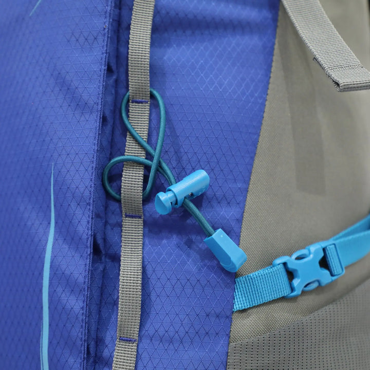 Detailed view of the trekking pole attachment system on the Vango Denali Pro rucksack, perfect for DofE hikers.