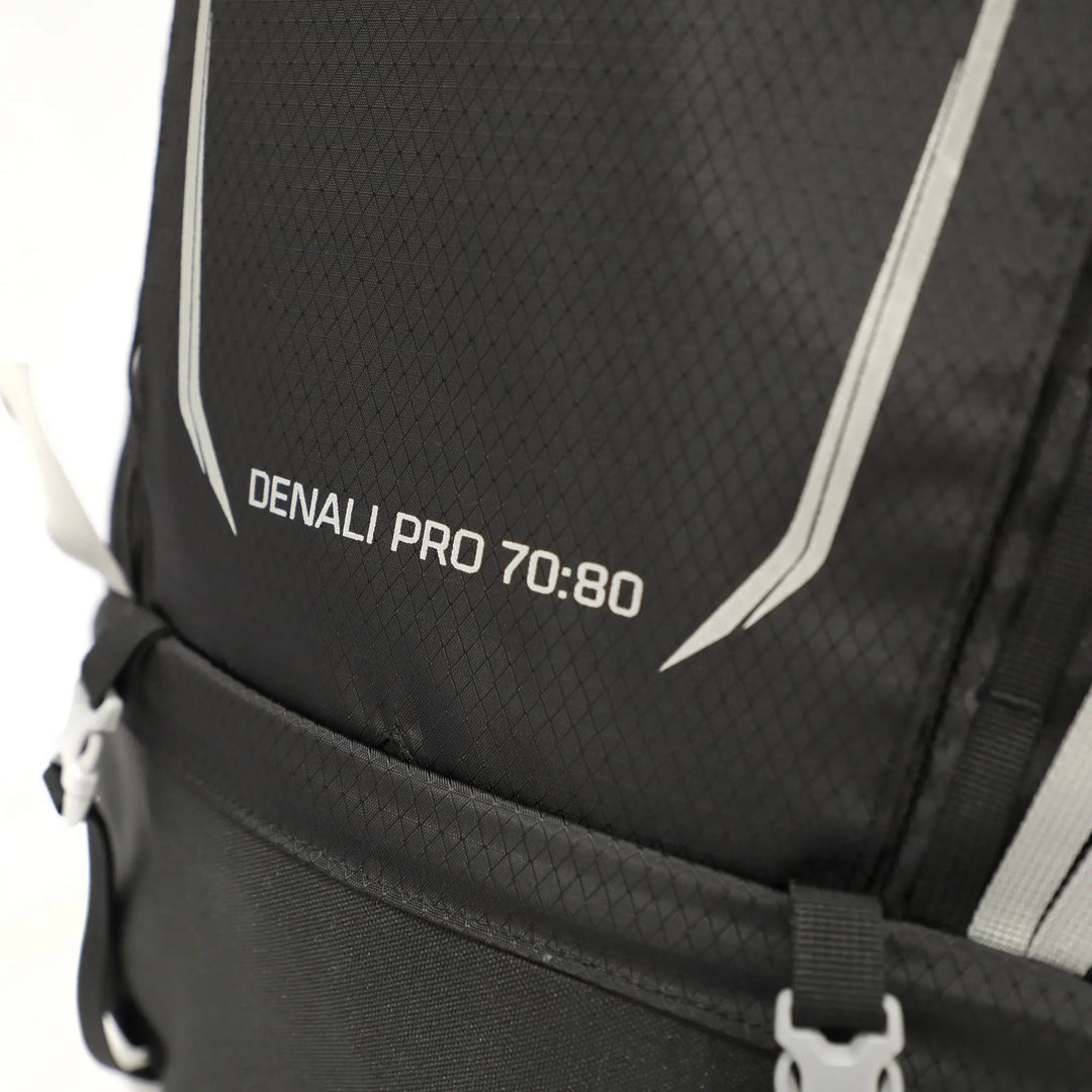 Close-up of the Vango Denali Pro 70:80 rucksack logo and front panel, designed for durability on DofE hikes.