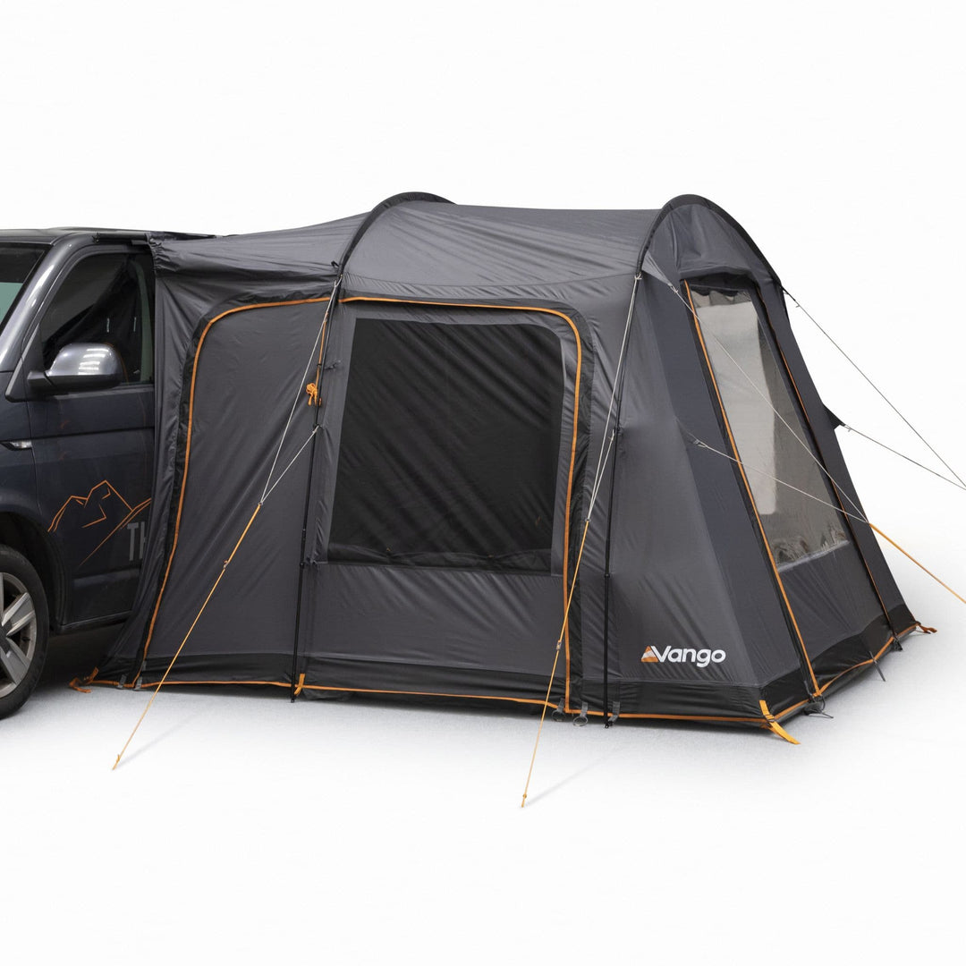 Vango Faros III Low (Poled) Drive Away Awning attached to a VW campervan, showcasing its compact and versatile design for camping trips.