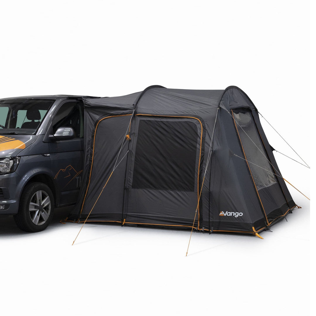 Side view of the Vango Faros III Low (Poled) Drive Away Awning attached to a VW campervan, showcasing its streamlined design and durable structure.