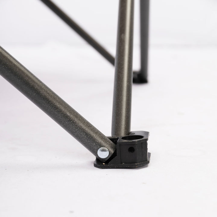 Detailed view of the Vango Fiesta Chair’s leg frame, showing the robust steel build for stability on various outdoor surfaces.