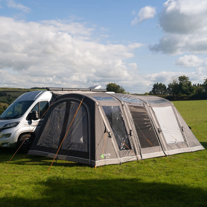 Vango Galli Pro AIR MID Drive-Away Awning pitched with its doors closed in a field