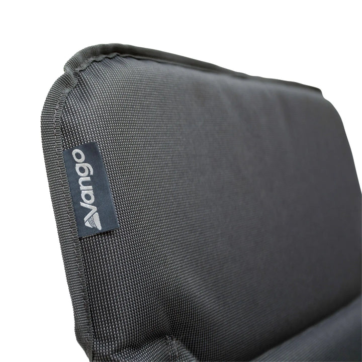 Close-up of the Vango logo on the padded headrest of the Vango Hampton Tall Reclining Camping Chair.