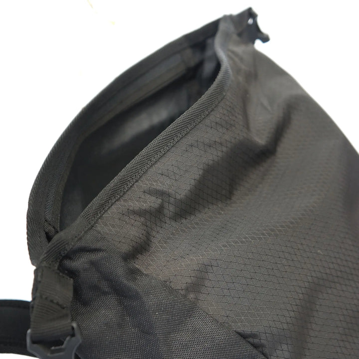 Close-up of the rolltop opening and sturdy fabric of the Vango Hex Rolltop 25L hiking backpack.