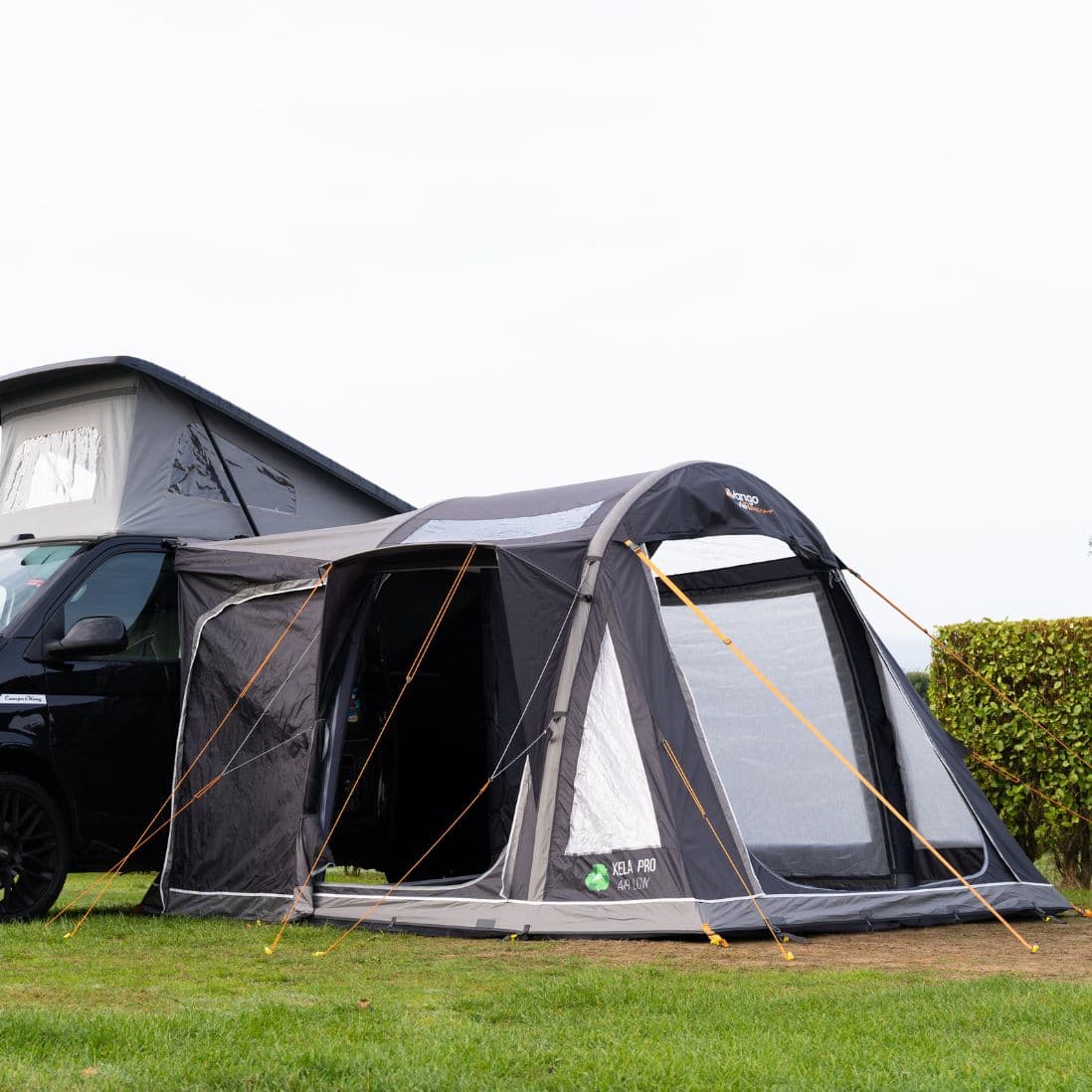 Vango Kela Pro Air Low Drive Away Awning fully set up, showcasing its sleek design and compatibility with low-roof campervans