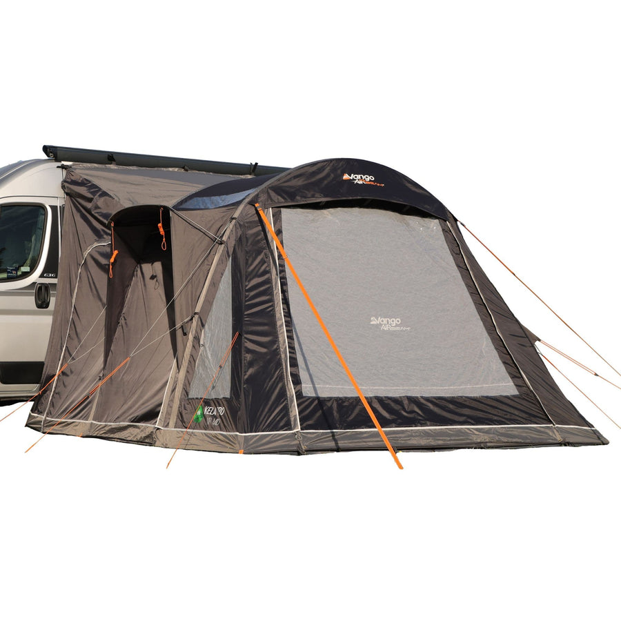 Side view of the Vango Kela Pro Air Mid Drive Away Awning attached to a campervan, showing its durable Vango AirBeam structure and mid-height compatibility.