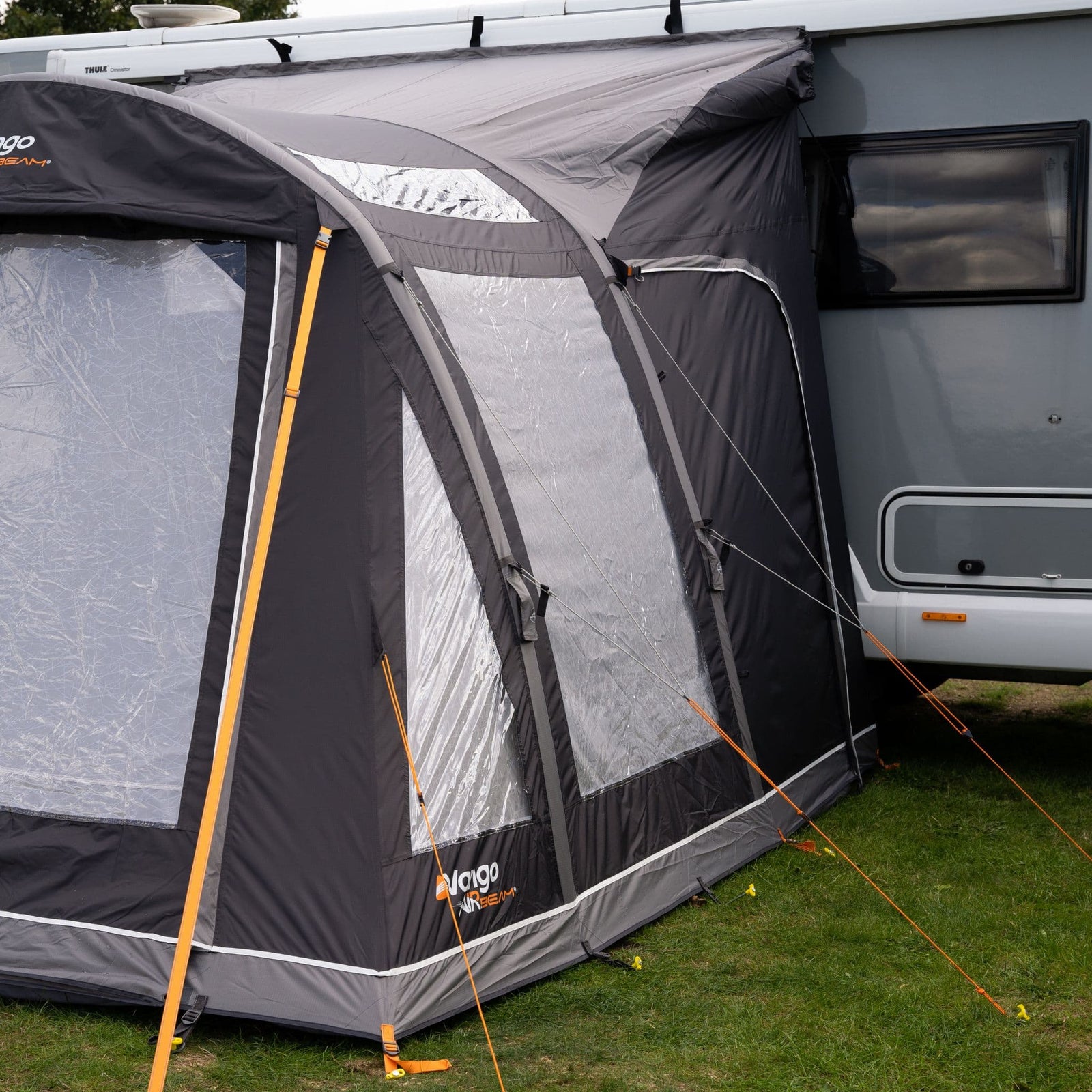 Close-up of the side view of the Vango Kela Pro Air Tall Drive Away Awning, showcasing its high-quality 6000HH fabric, Skylight Windows, and sturdy AirBeam structure.