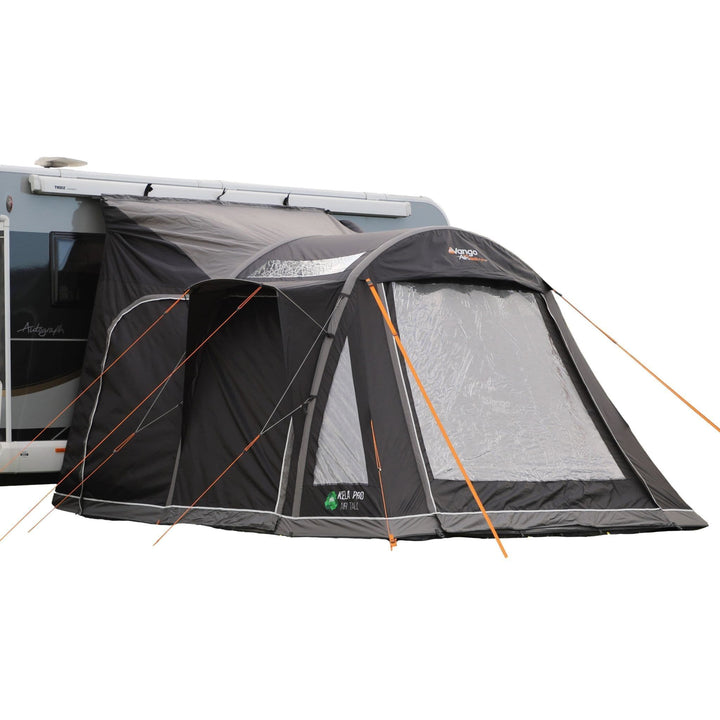 Vango Kela Pro Air Tall Drive Away Awning attached to a motorhome, featuring Pre-angled Beams and Skylight Windows for enhanced stability and natural light.